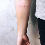 Morse code tattoo on the forearm