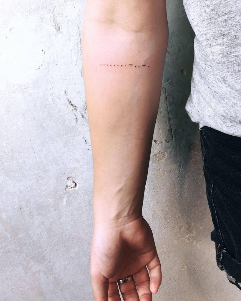Morse code tattoo on the forearm 
