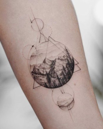Mountainous landscape and geometry tattoo