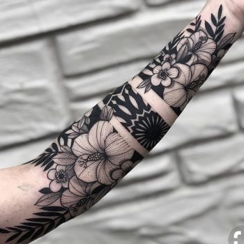 Negative space floral forearm tattoo - Tattoogrid.net