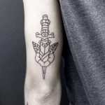 Outline dagger and rose tattoo