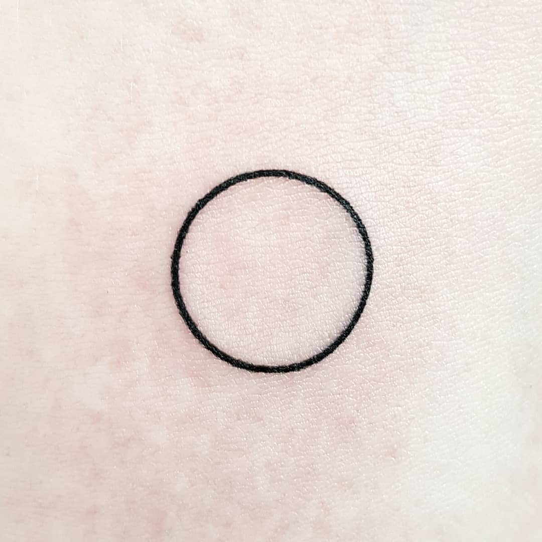 Perfect minimalist circle tattoo