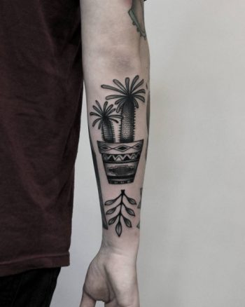 Potted pachypodium and a sprig of greenery tattoo