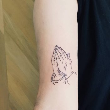 Praying hands tattoo by Rhys Pieces