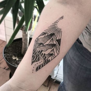 Rhombus-shaped mountainous landscape with a road