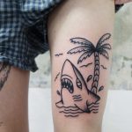 Shark and palm tree tattoo