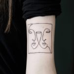 Sketchy double face tattoo
