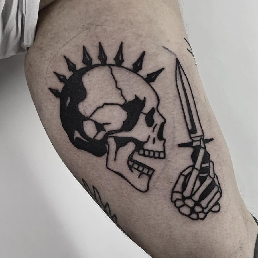 Skull with a dagger