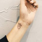 Small heart tattoo by Cholo