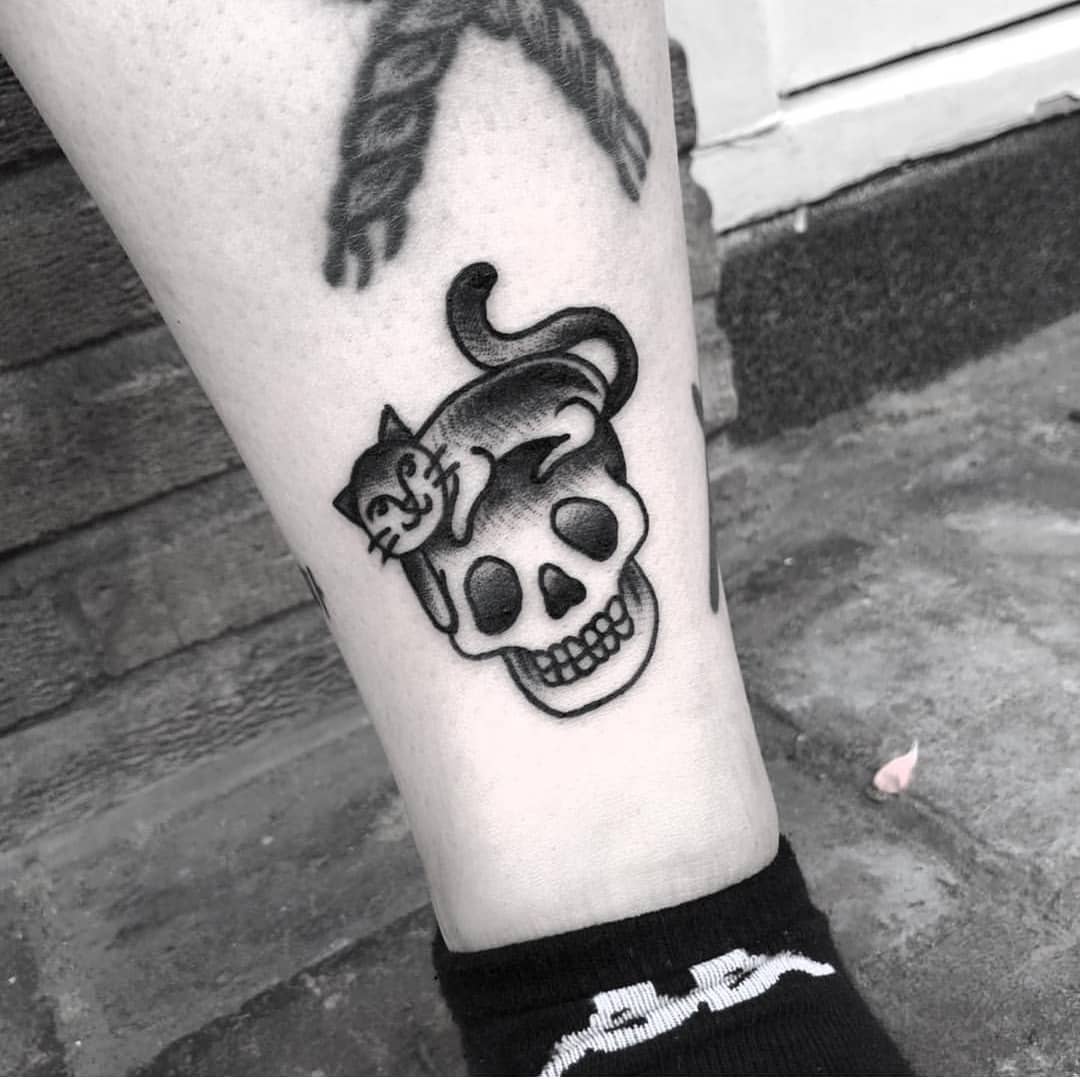 Small kitty and skull tattoo by Twelve Seconds