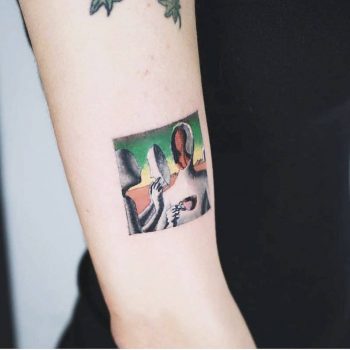 Surrealist painting tattoo