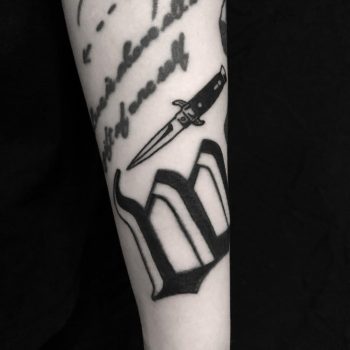 Tiny knife tattoo done at BK Ink Studio