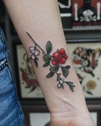 Tiny little cranberry tattoo on the wrist
