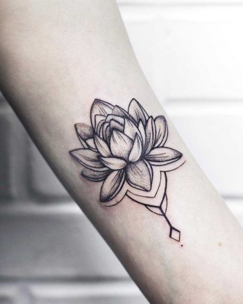 Tiny tender lotus tattoo