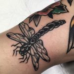 Traditional dragonfly tattoo
