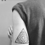 Triangular mandala tattoo