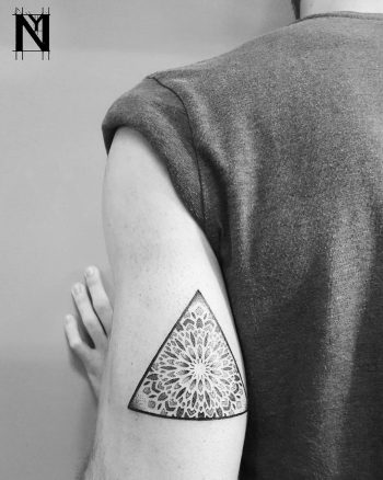 Triangular mandala tattoo