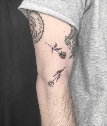 Two falling roses tattoo