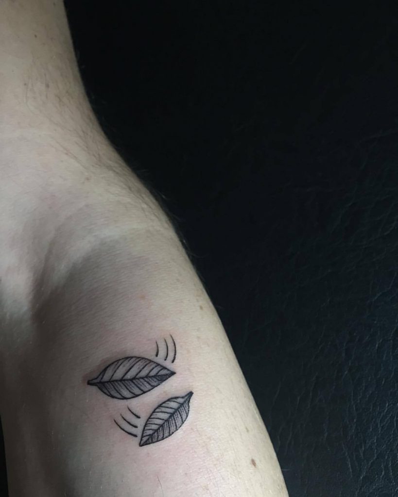 Two small leaves tattoo