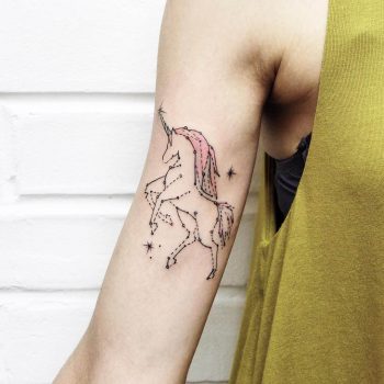 Unicorn tattoo on the right arm