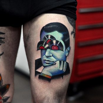 Vinyl man tattoo done at Fronte Del Porto Tattoo studio