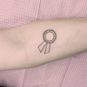 Award ribbon tattoo by Jen Wong