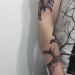 Bear, wolf, and deer tattoos