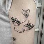Beautiful dove tattoo on the arm