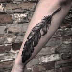 Big feather tattoo