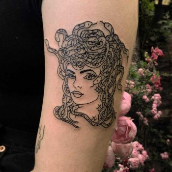 Black and grey Medusa tattoo