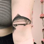 Black and grey fish tattoo