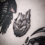 Blackwork gem tattoo by Chino Tattooer