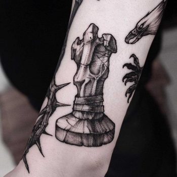 Bone figurine tattoo