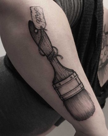 Brush tattoo done at True Body Art