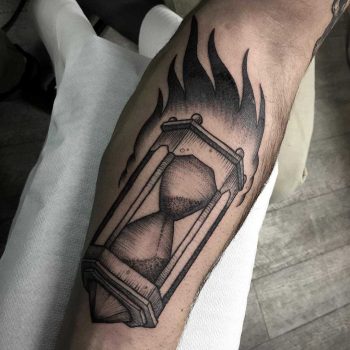 Burning hourglass tattoo