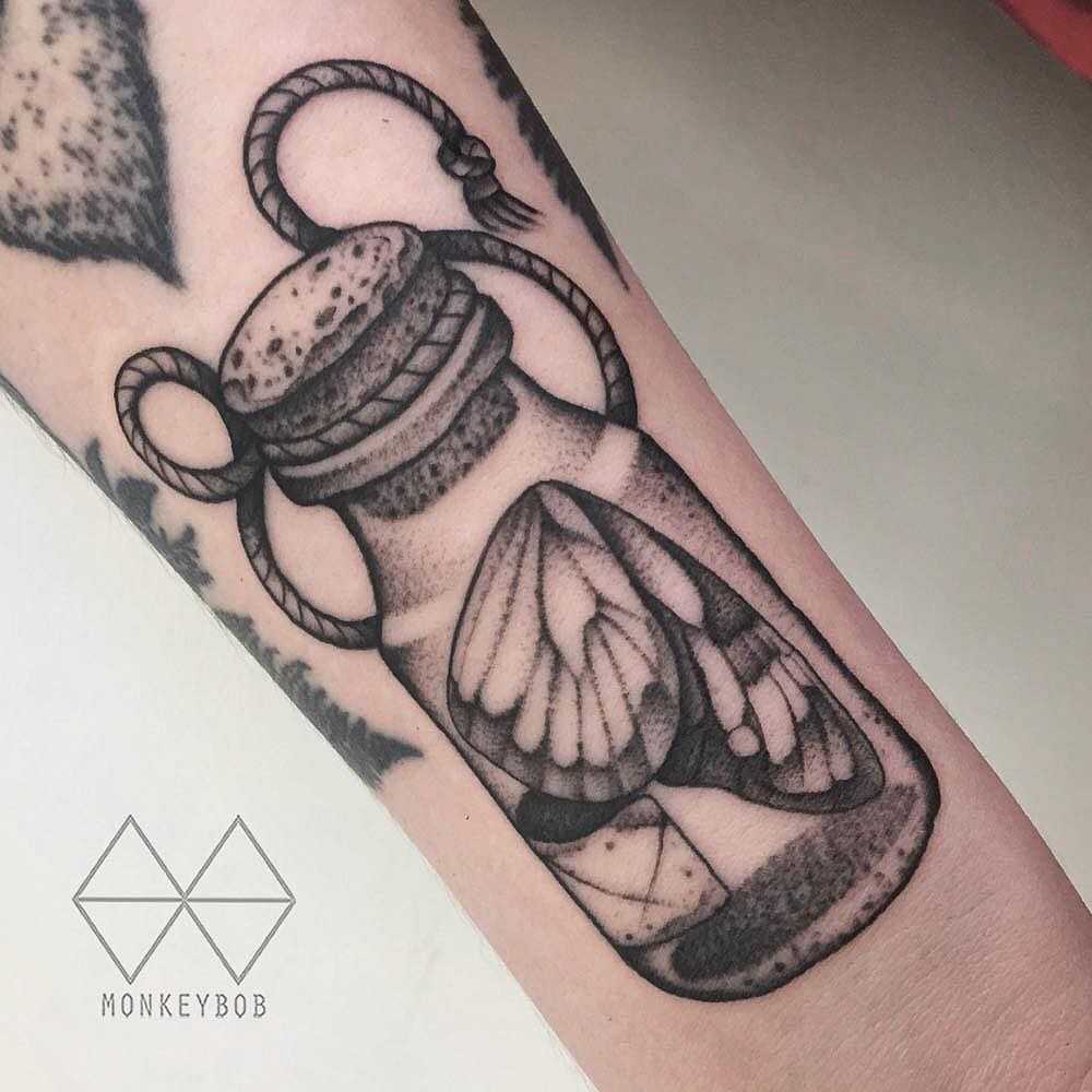 Butterfly in a jar tattoo