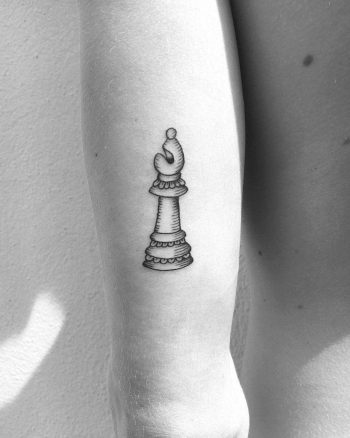Chess figurine tattoo