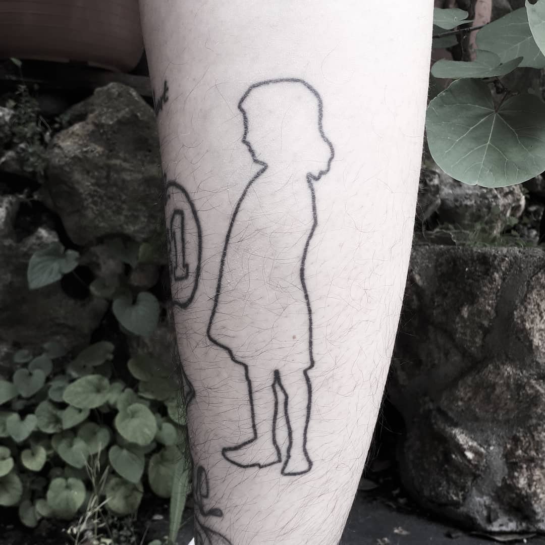 Child’s silhouette tattoo