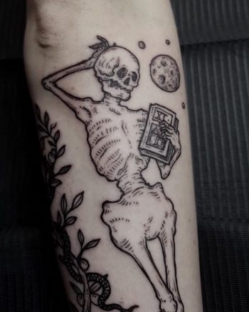 Chilling skeleton tattoo