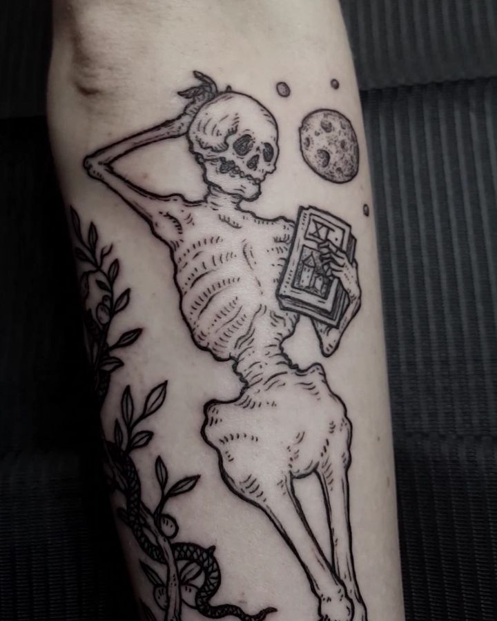 Chilling skeleton tattoo