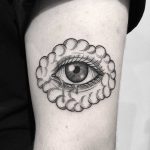Cloudy eye tattoo