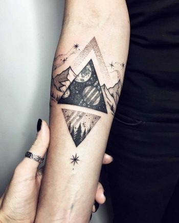 Cosmic triangle tattoo by Sasha Tattooing