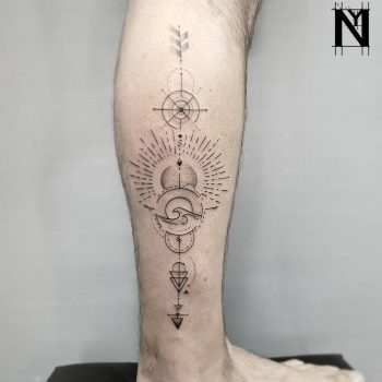 Custom sun and wave tattoo