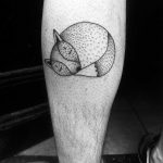 Cute curled-up fox tattoo