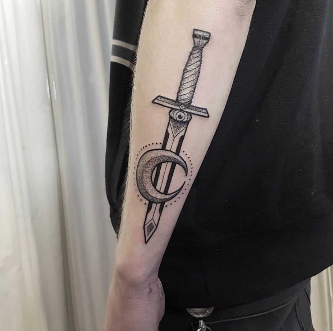 Dagger and moon tattoo by Thye Houben