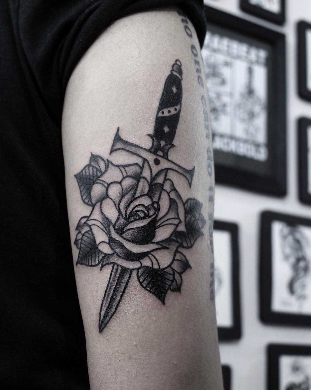 Dagger and rose tattoo by Rae Beat