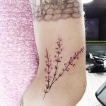 Delicate flower tattoo by Helen XU