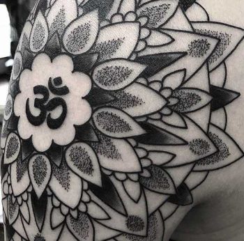 Detailed OM mandala tattoo by Daniel Jay Nodianos