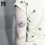 Dot-work Lotus and circles tattoo