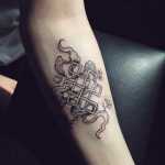Endless knot and smoke tattoo